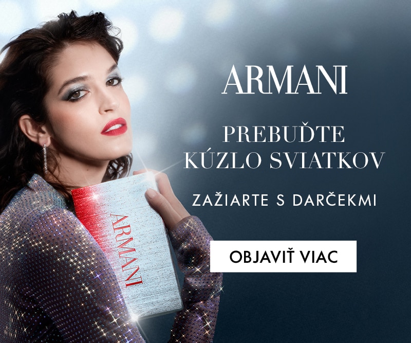 Luxusný darček Armani na sviatočnom pozadí s nápisom Prebuďte kúzlo sviatkov – elegantné balenie pre vianočné darčeky.