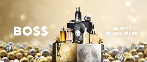 Hugo Boss vianočné darčekové sady parfémov v zlatom a striebornom balení obklopené vianočnými ozdobami.