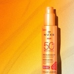 150 ML Nuxe SUN Jemný opaľovací sprej na tvár a telo s veľmi vysokou ochranou SPF 50 2 of 3 Jemný opaľovací sprej na tvár a telo s veľmi vysokou ochranou SPF 50