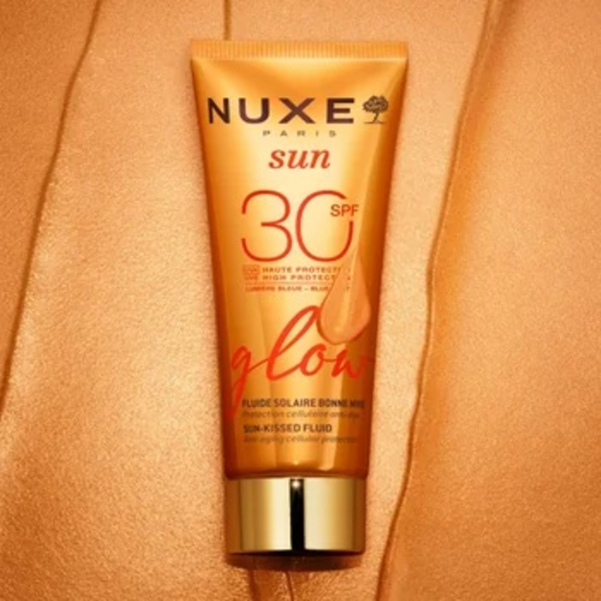 40 ML Nuxe SUN Trblietavý rozjasňujúci ochranný fluid na tvár s vysokou ochranou SPF 31 1 of 3