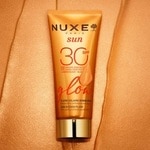 40 ML Nuxe SUN Trblietavý rozjasňujúci ochranný fluid na tvár s vysokou ochranou SPF 31  3 of 3 Trblietavý rozjasňujúci ochranný fluid na tvár s vysokou ochranou SPF 31